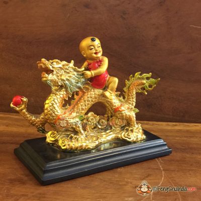 Qui Yong riding Dragon