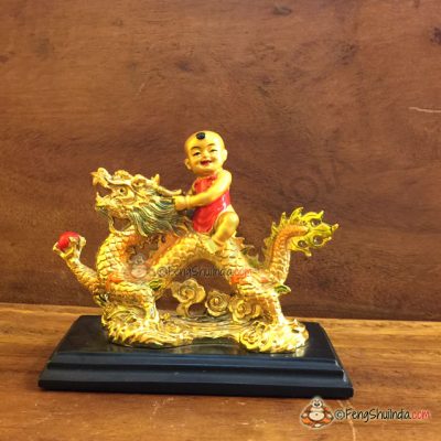 Qui Yong riding Dragon